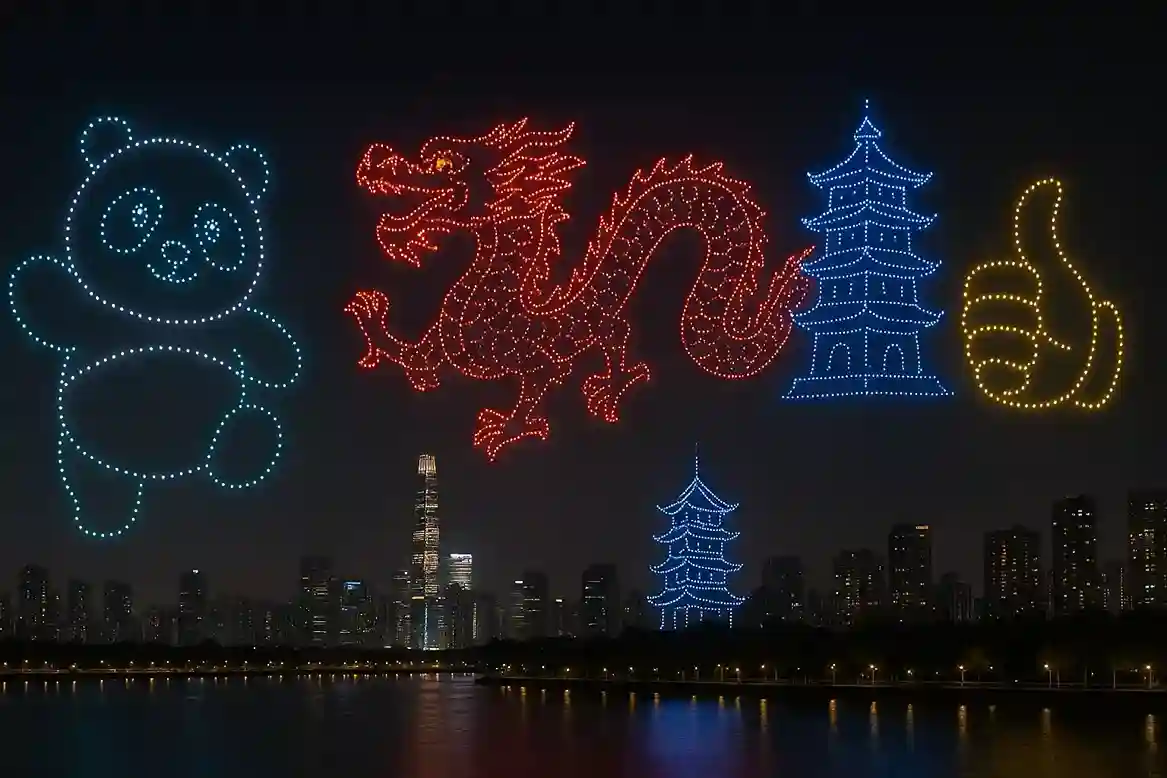 Colorful drone light formations in the sky over a Chinese city